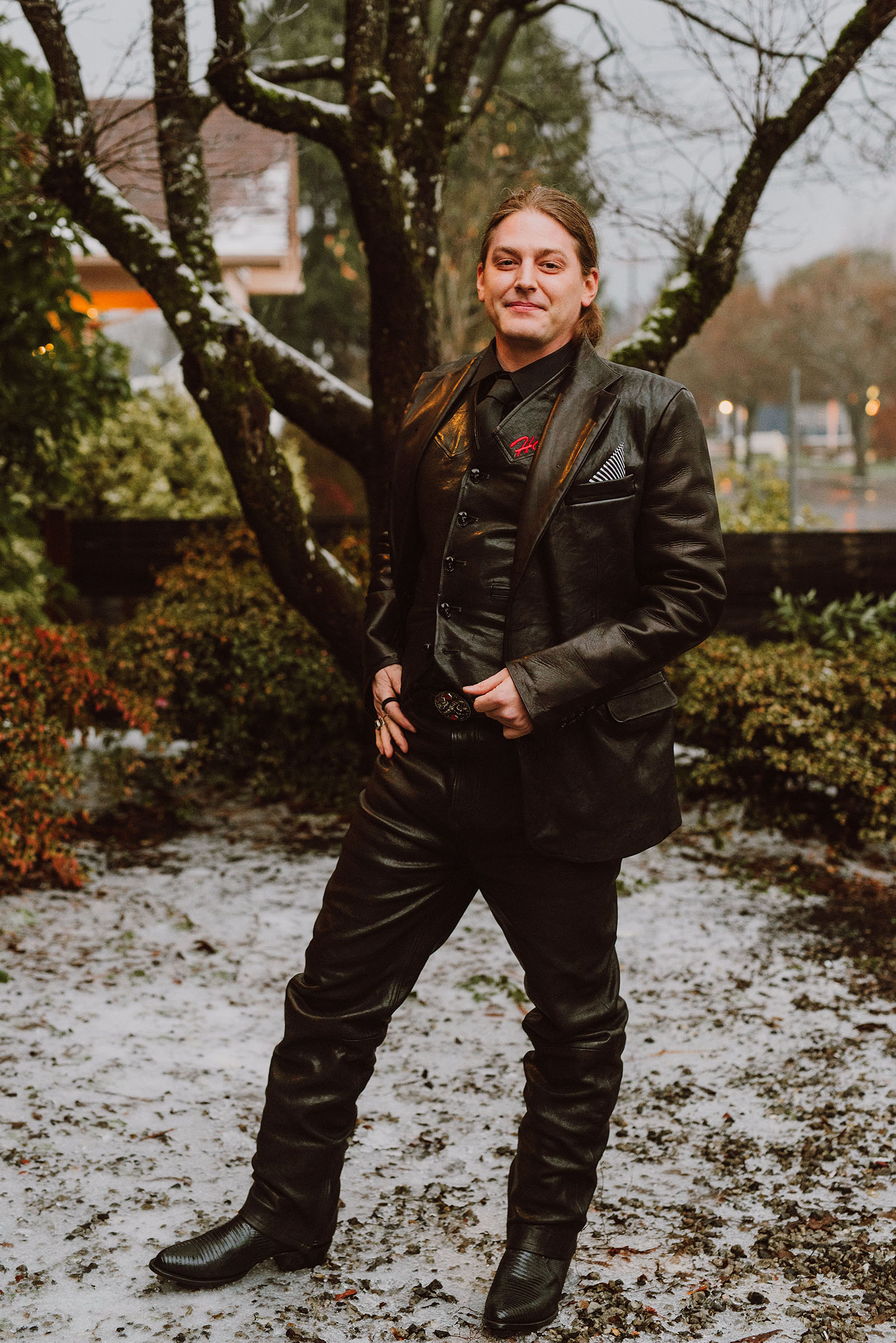 Groom in a three piece leather suit at The Colony St Johns Wedding