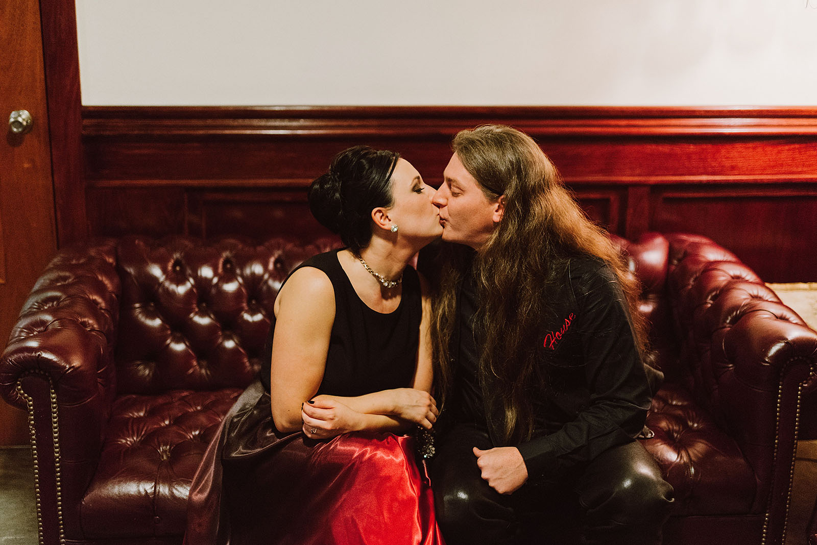 Bride and Groom kissing in the backroom at The Colony St Johns Wedding