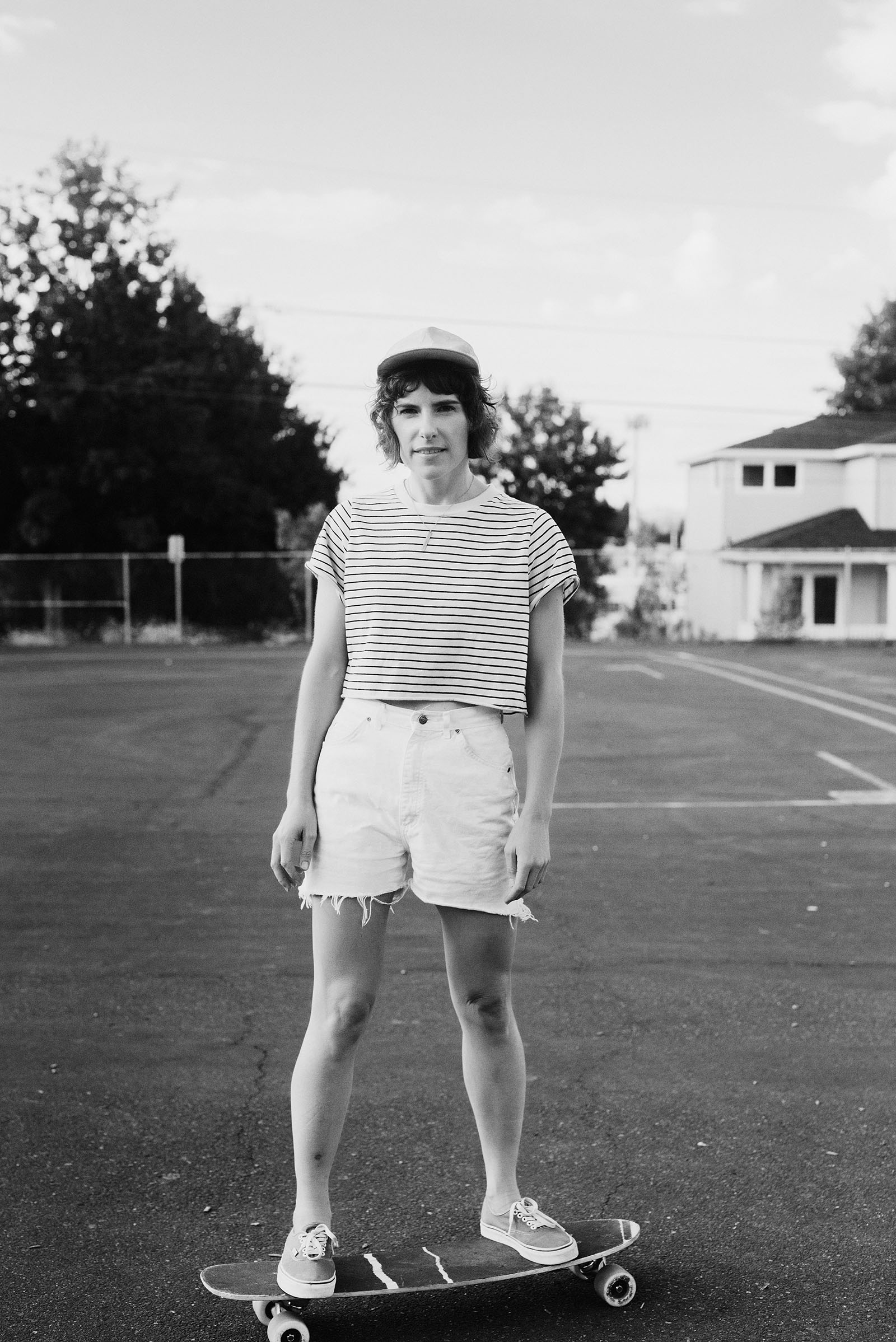 portrait of local illustrator Catherine Odell on her skateboard - portland wedding photography