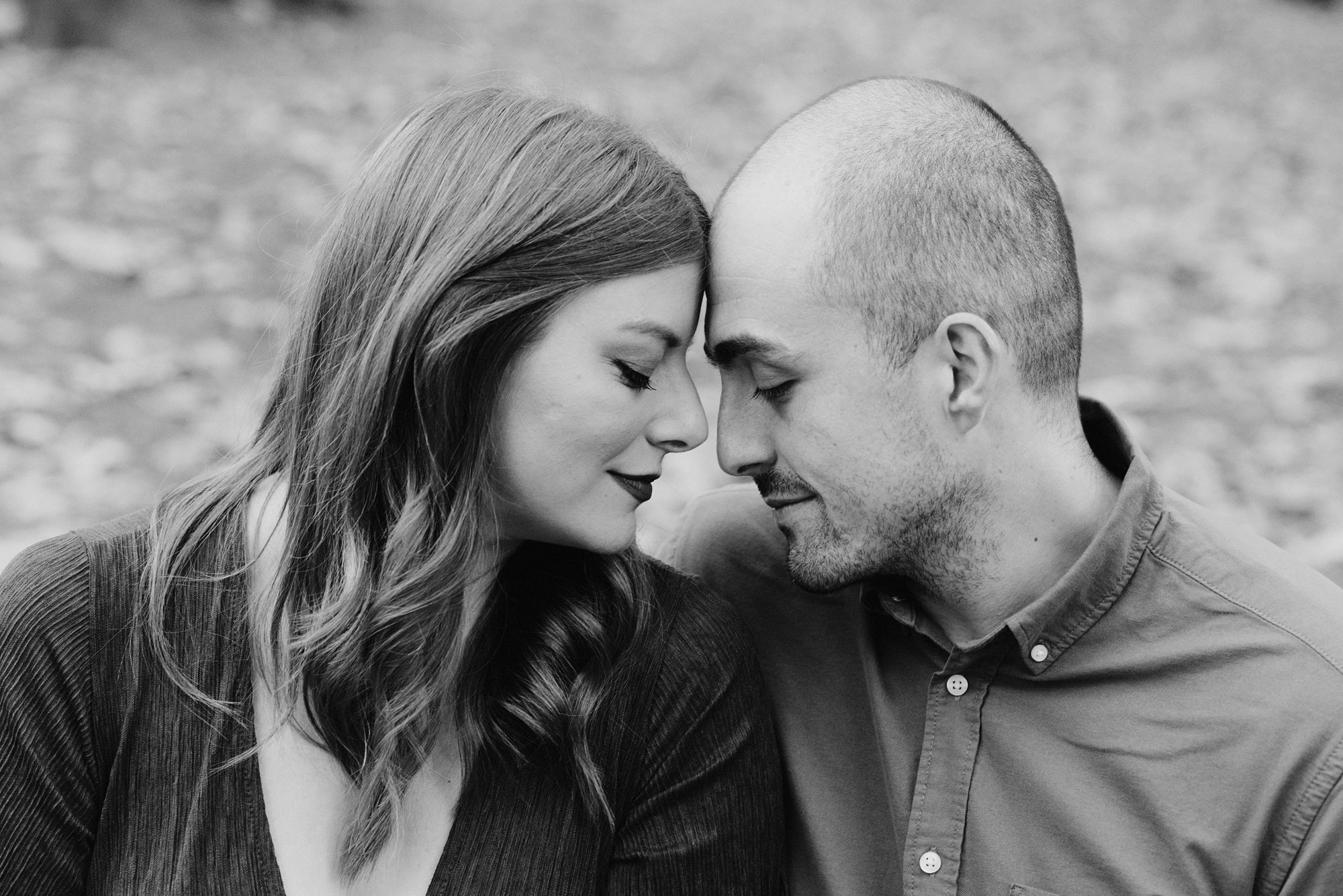 Engaged couple portrait in Laurelhurst Park