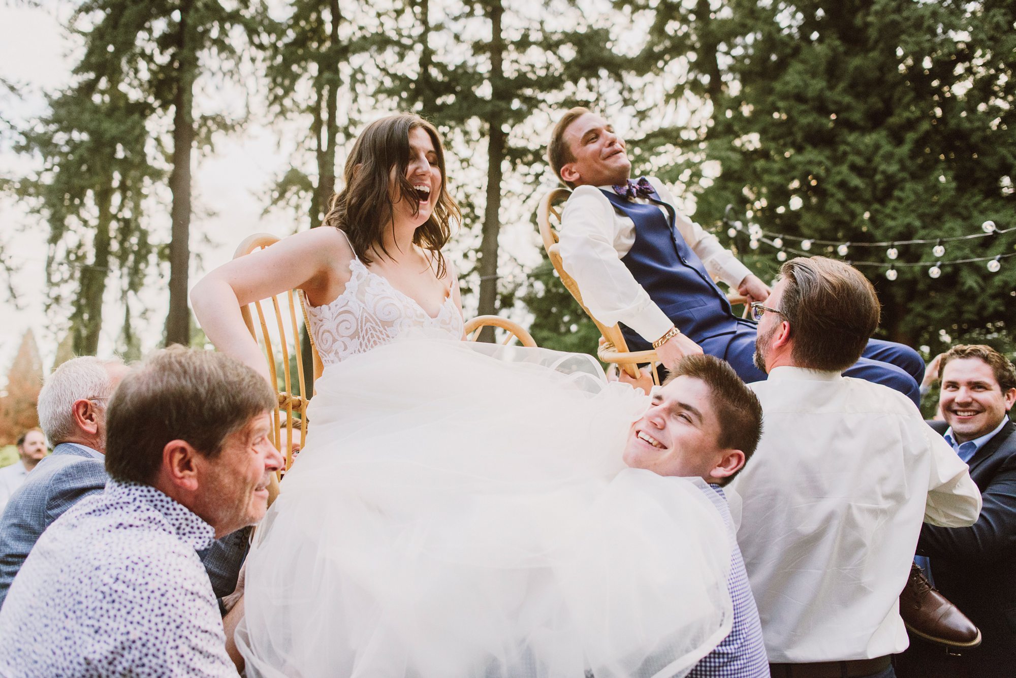 Bride and Groom being lifted during a hora | Portland Wedding Photographer