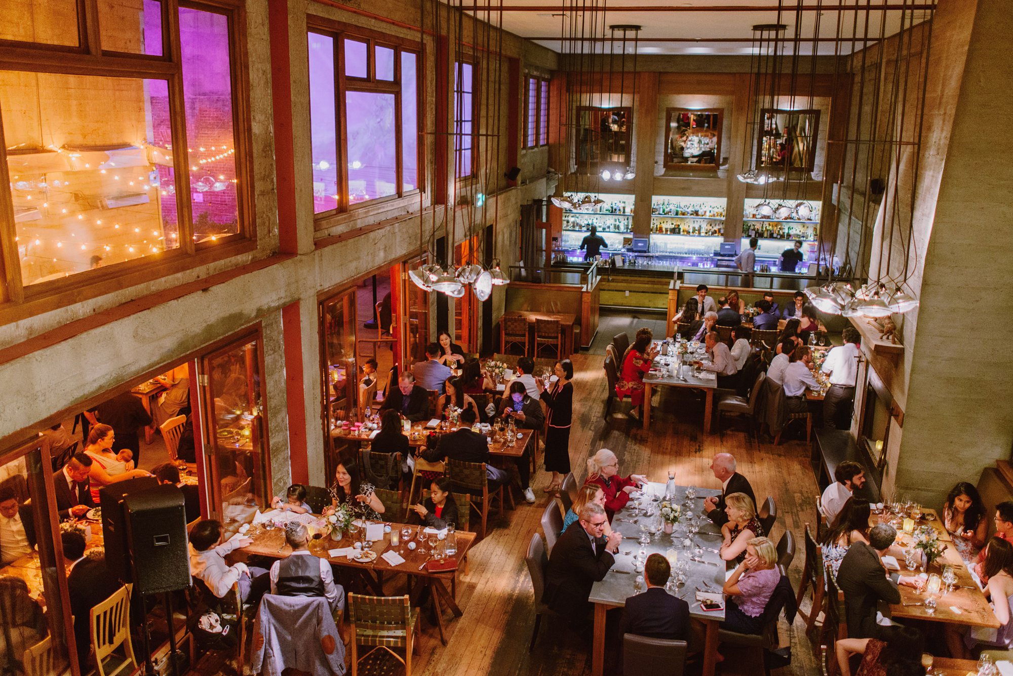 Aerial view of reception dining hall at Foreign Cinema | San Francisco Wedding Photographer