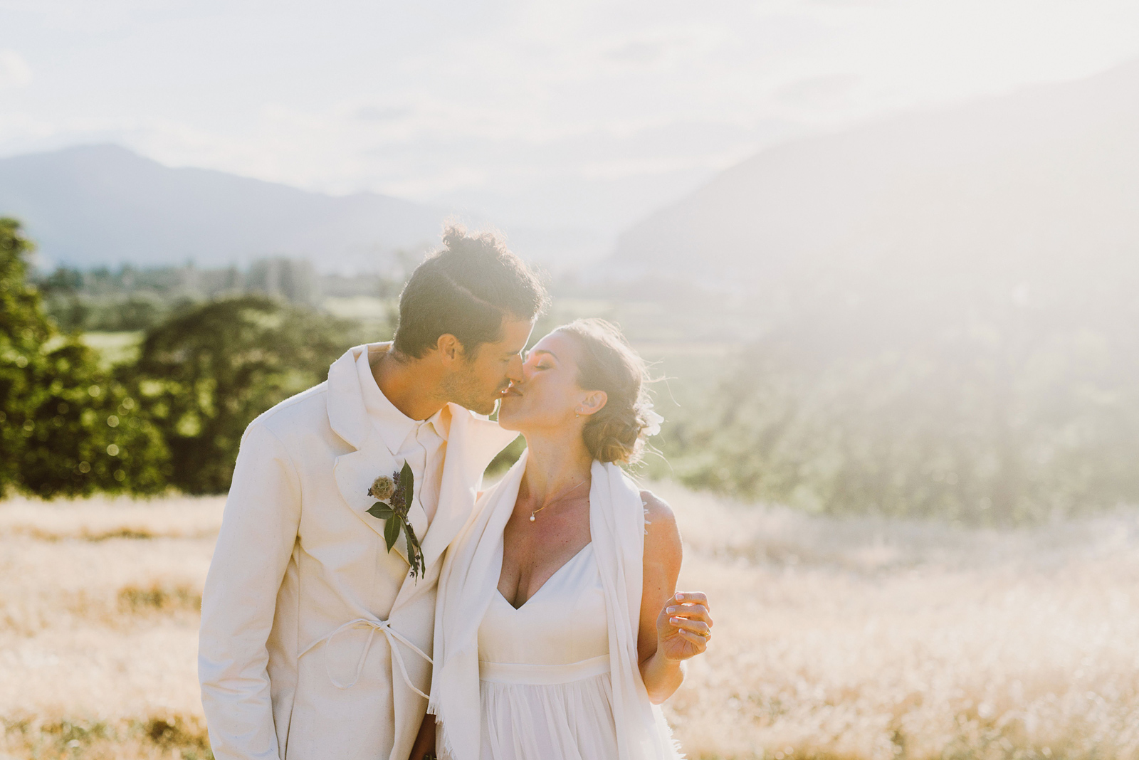 Bride and Groom kissing during the golden hour - Columbia River Gorge wedding in Mosier, OR