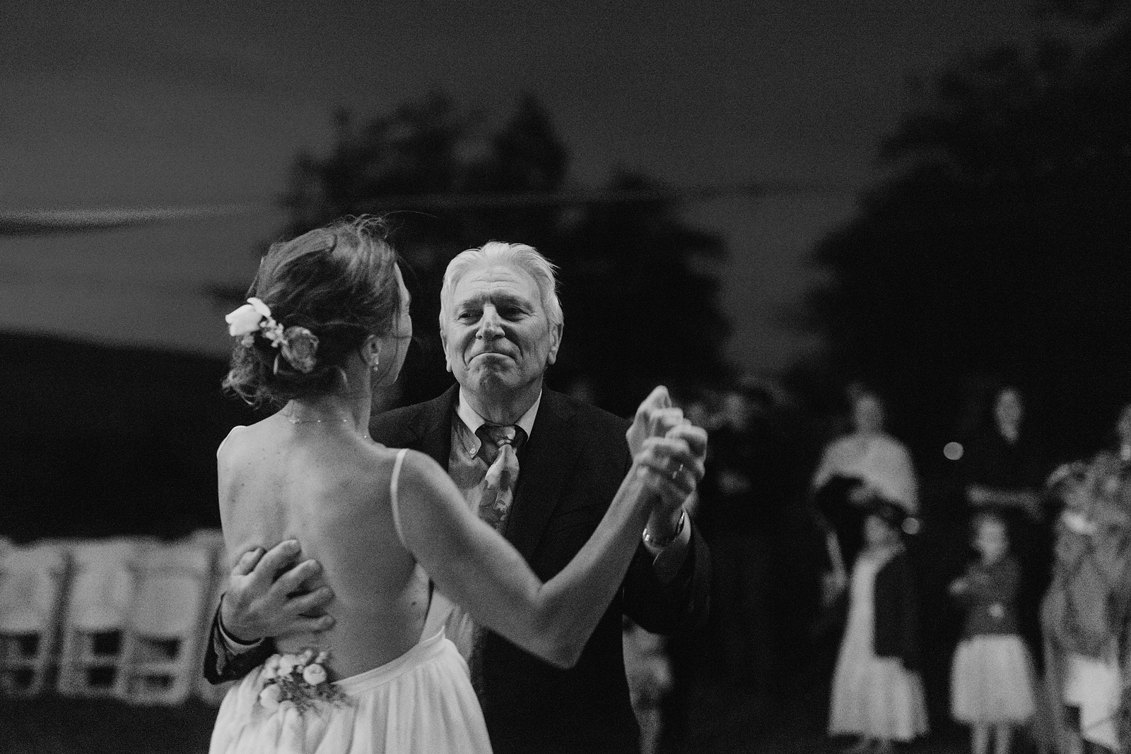 Father of the bride smiling during the Father Daughter Dance - Columbia Gorge River Wedding in Mosier, OR