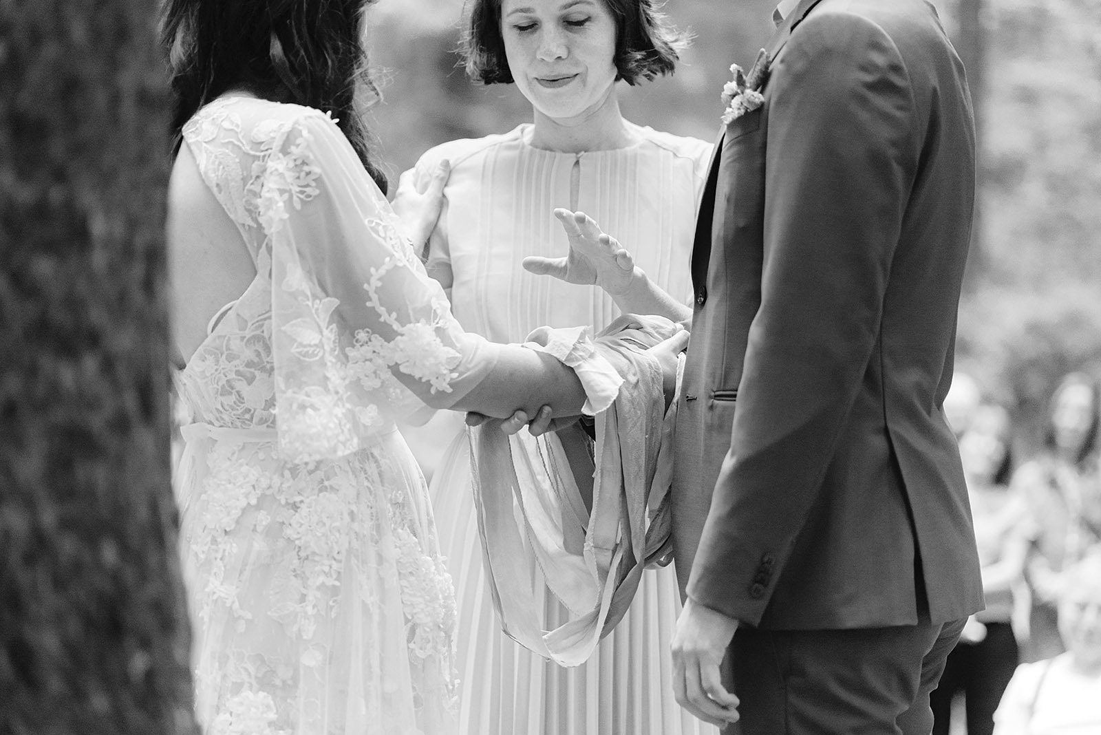 Officiant giving her blessing during a handfasting ceremony - Trout Lake Wedding, WA