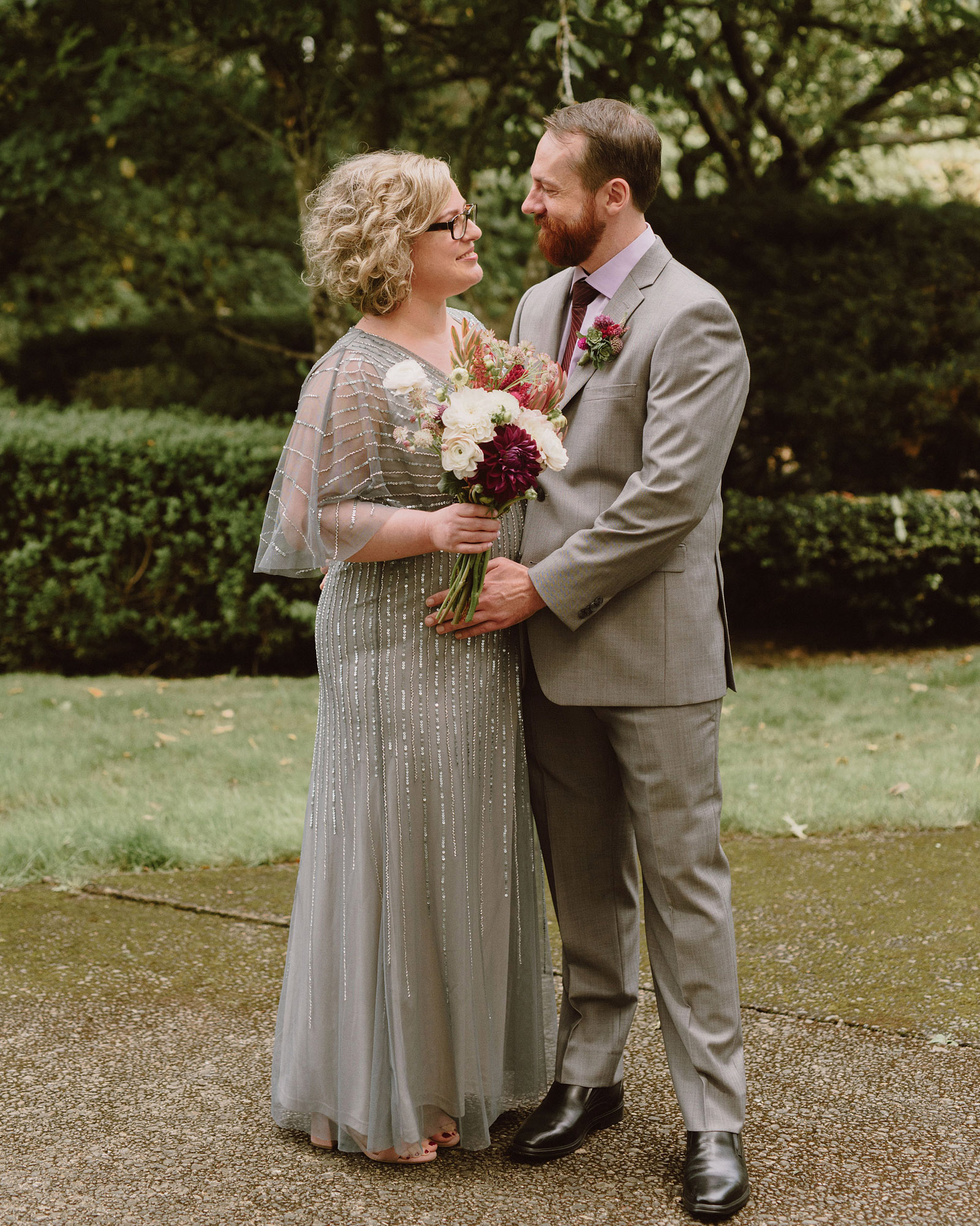 Portrait of Bride and Groom in the back garden at their Oaks Pioneer Church Wedding